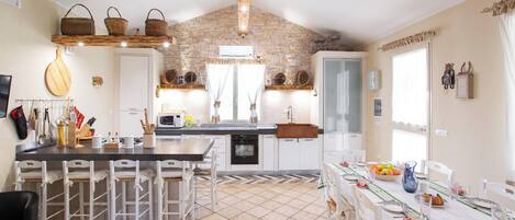Villa | Private kitchen | Dishwasher, espresso maker, electric kettle