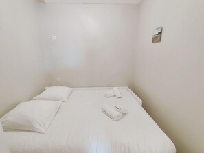 1 quarto, Wi-Fi de cortesia, roupa de cama