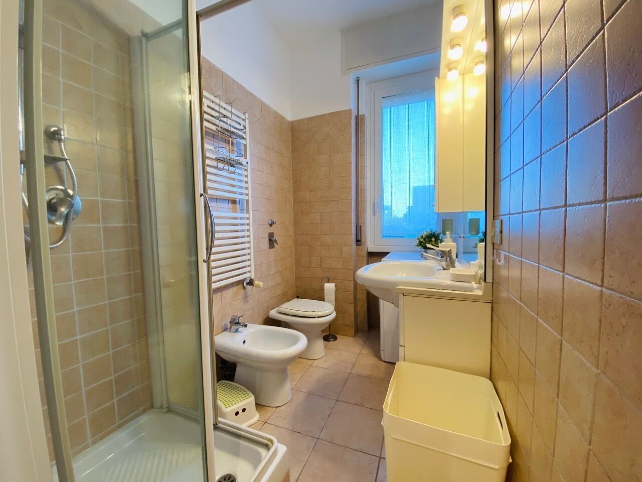 City Apartment | Bathroom | Shower, rainfall showerhead, hair dryer, bidet