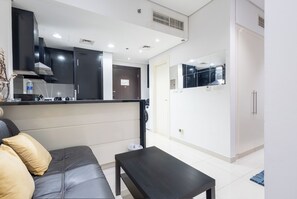 Design Studio, Balcony, City View | Living area | 32-inch Smart TV with cable channels - SuperHost - Chic Studio on the 16th Floor in Business Bay (Dubai)