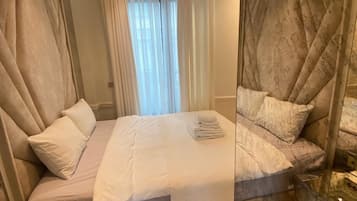 2 habitaciones, tabla de planchar con plancha, wifi y ropa de cama