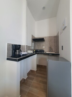 Business Suite | Private kitchen | Full-sized fridge, oven - Apartahotel BAQ 44 (Barranquilla)