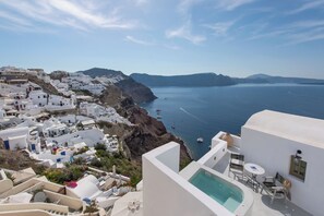 Panoramic sea views from this hillside village, where you can relax by the pool.