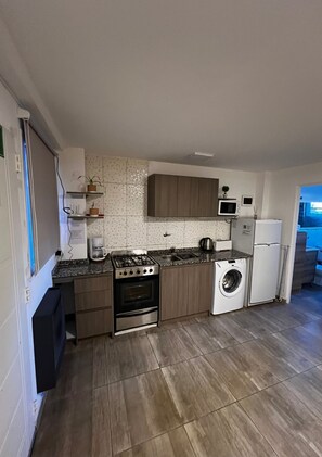 Family Studio, Patio | Private kitchen