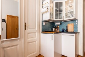 Fridge, microwave, stovetop, cookware/dishes/utensils