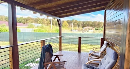 Pet friendly wooden house near forest in a very quiet area is waiting for you.