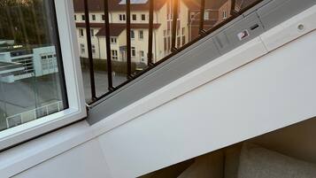 Condo urbano, vista para o parque | Vista do quarto