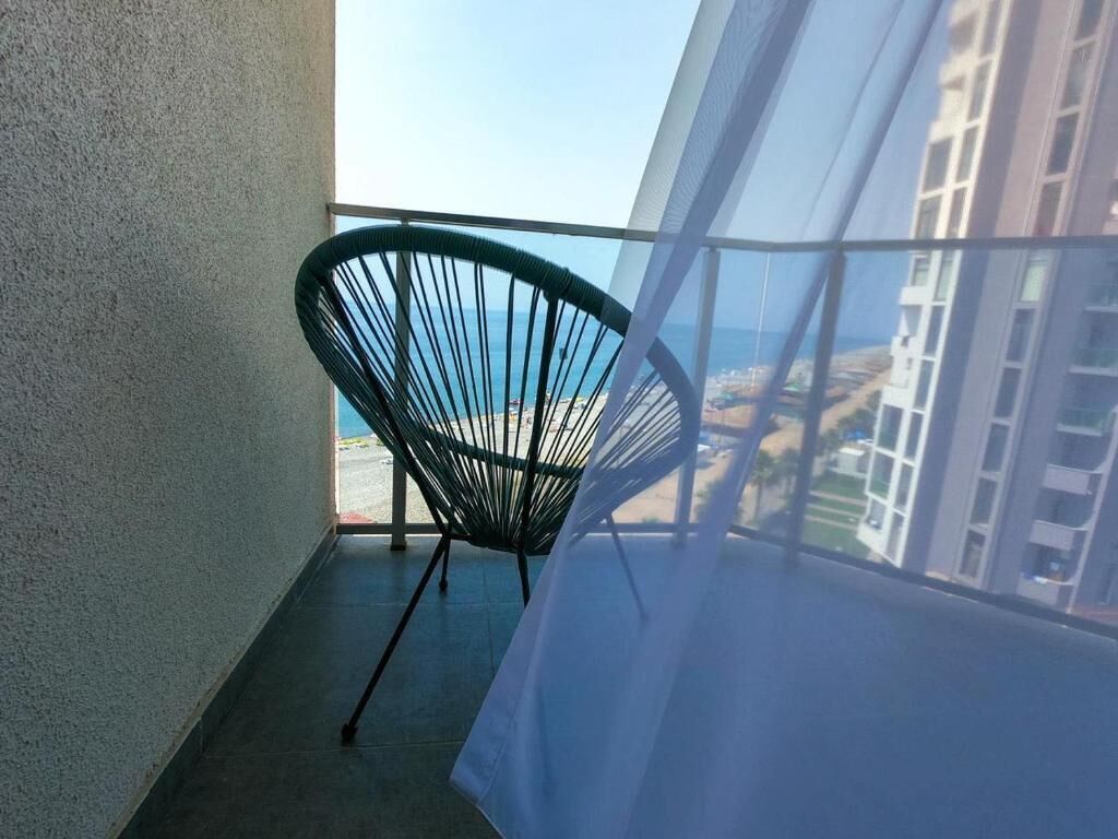 Deluxe Double Room, Sea View | Minibar, in-room safe, desk, laptop workspace