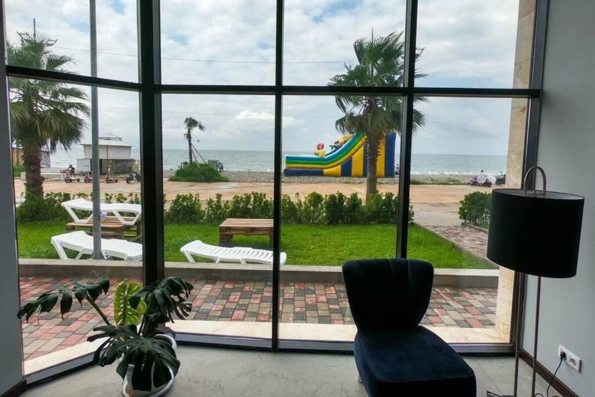 Deluxe Double Room, Sea View | Minibar, in-room safe, desk, laptop workspace