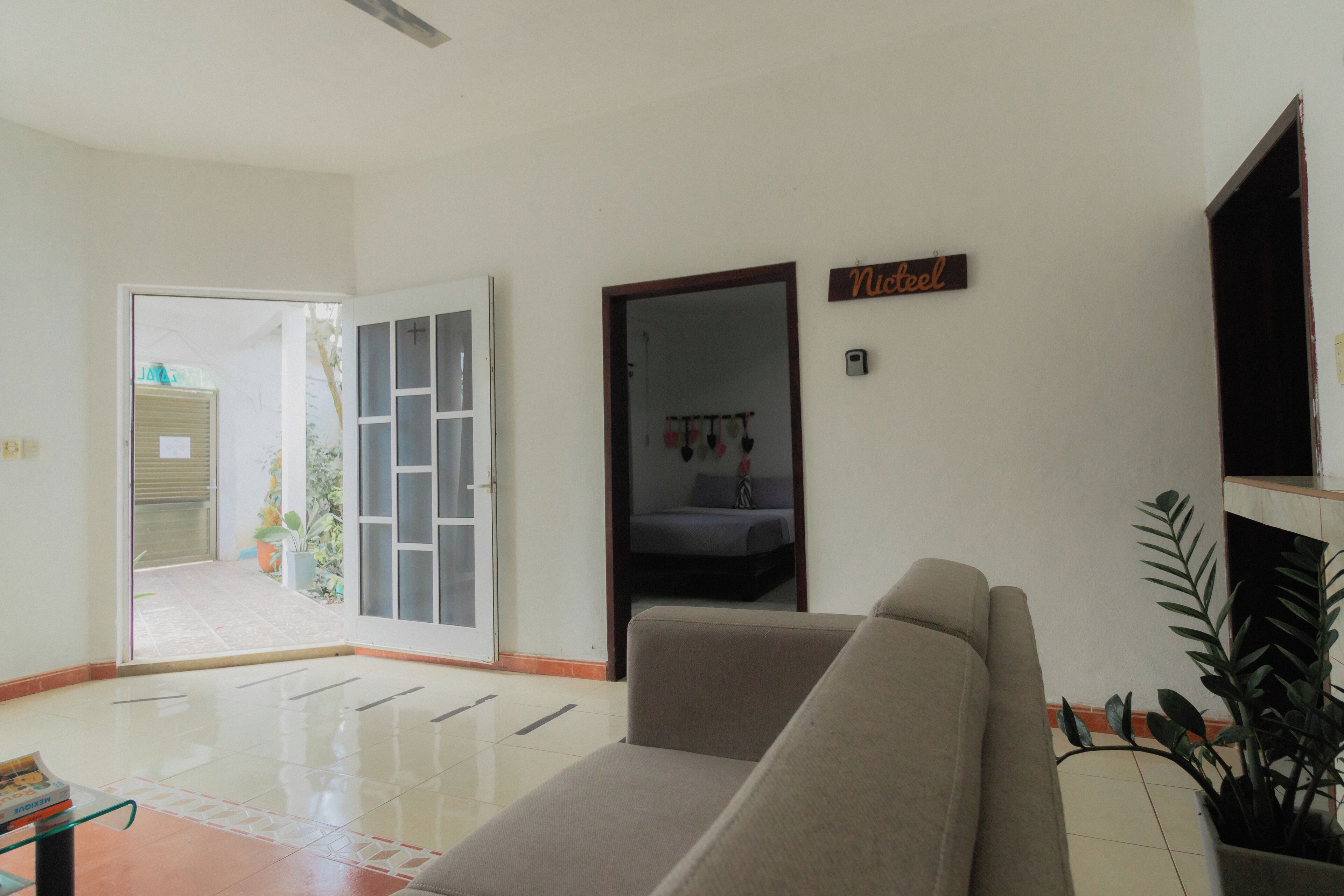 Classic Quadruple Room, Garden View | Desk, free WiFi