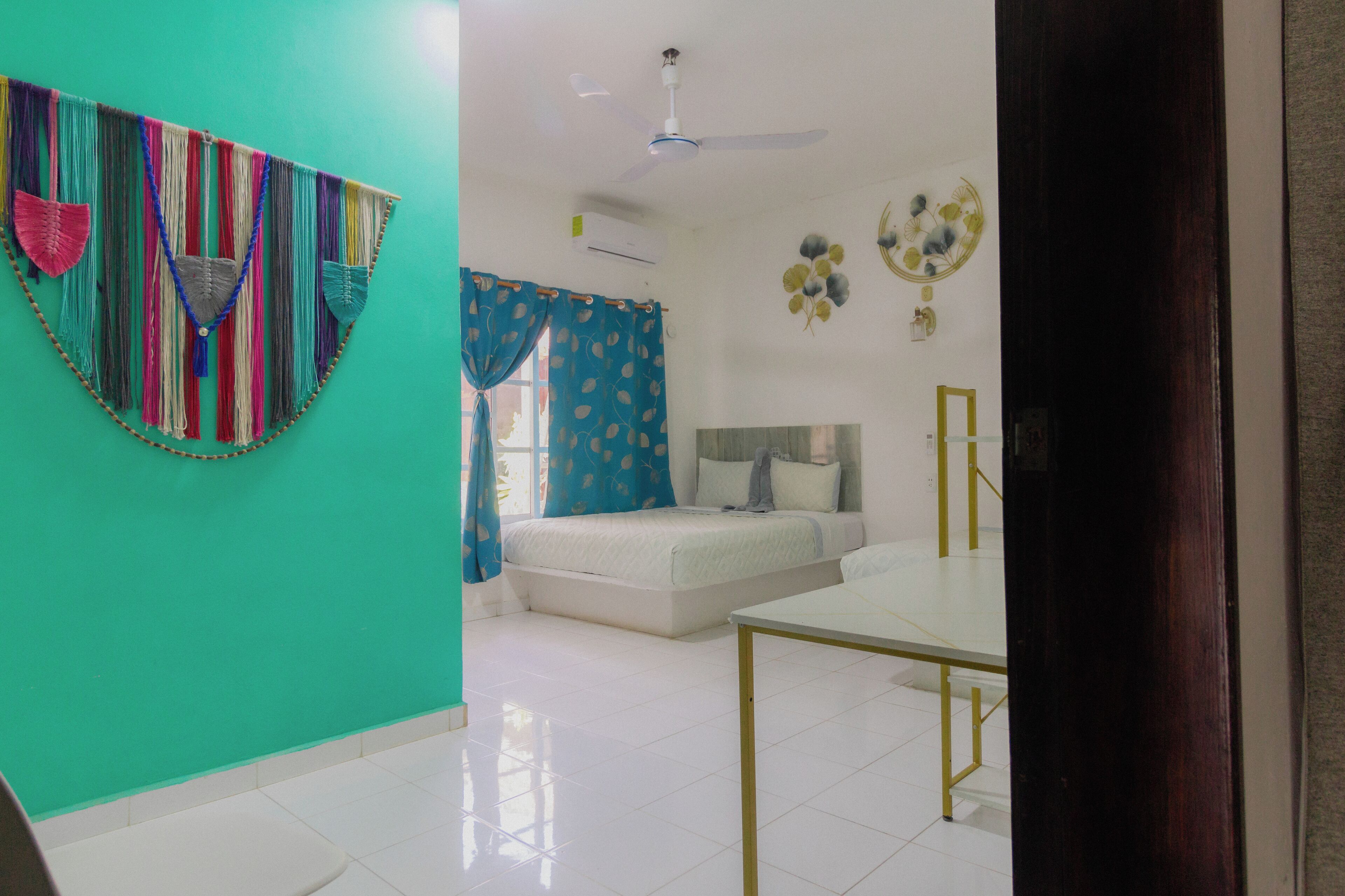 Comfort Quadruple Room, 2 Queen Beds, Courtyard View