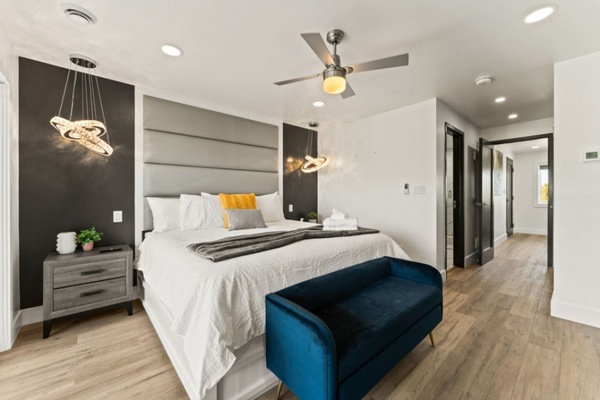 King Bedroom with Crisp white walls create a serene retreat.