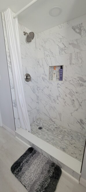 Shower, towels, soap, shampoo