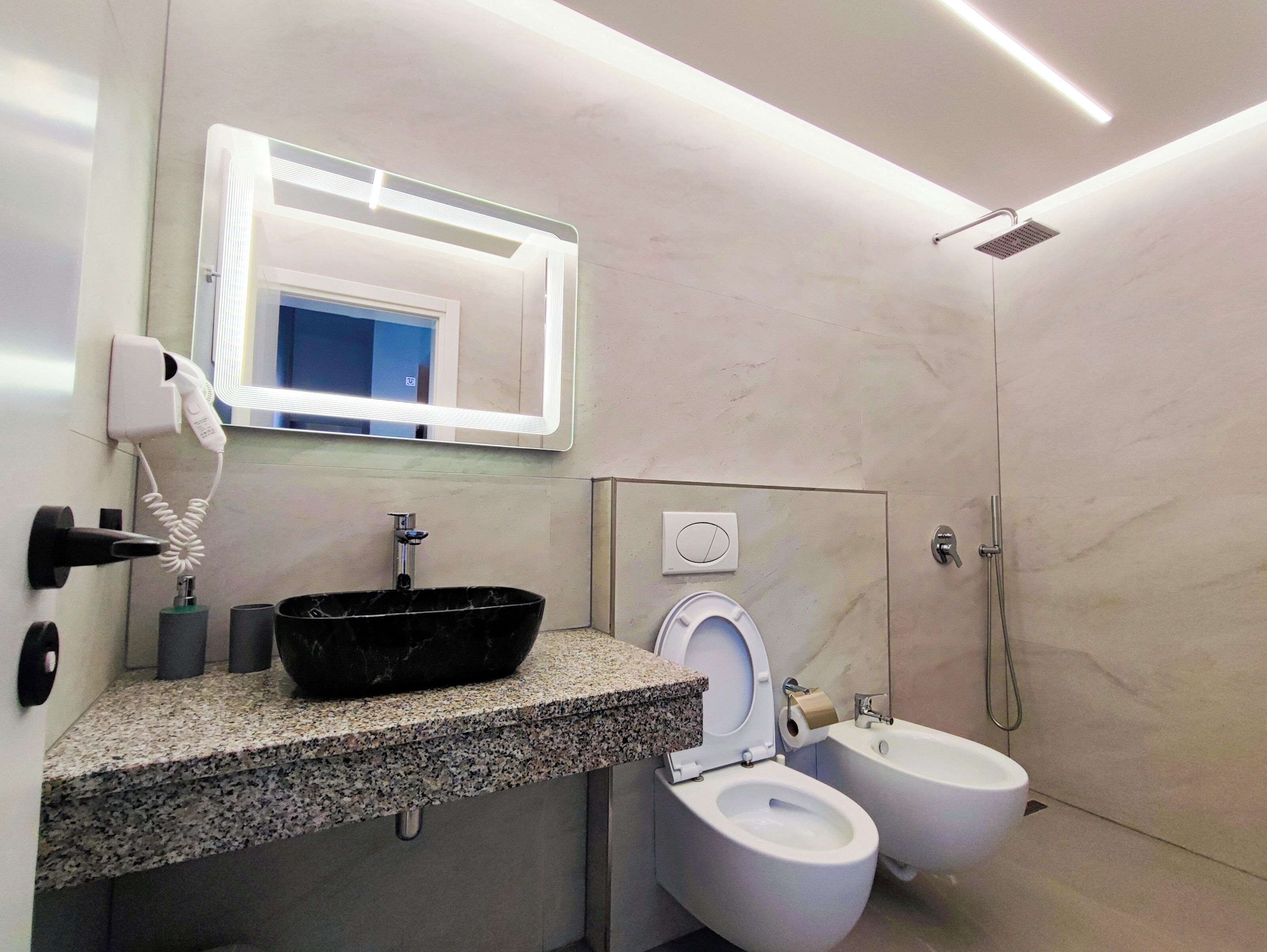 Hair dryer, towels, soap, toilet paper