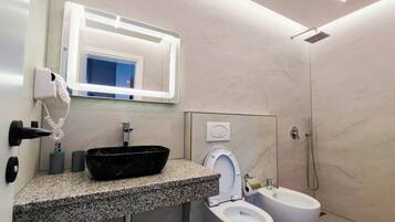 Hair dryer, towels, soap, toilet paper