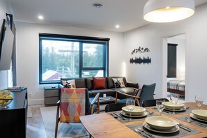 Condo | Living area | 40-inch flat-screen TV with cable channels - Summit Views by Revelstoke Vacations (Revelstoke)