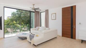 Family Apartment, Garden View | Living area | 50-inch Smart TV with digital channels