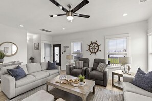Smart TV, fireplace, books, stereo