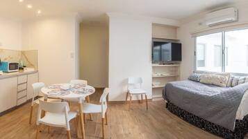 Luxury Apartment | Private kitchen | Full-sized fridge, microwave, toaster, cookware/dishes/utensils