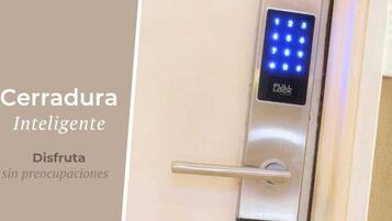 A door with an intelligent lock system featuring a keypad and a full lock indicator.