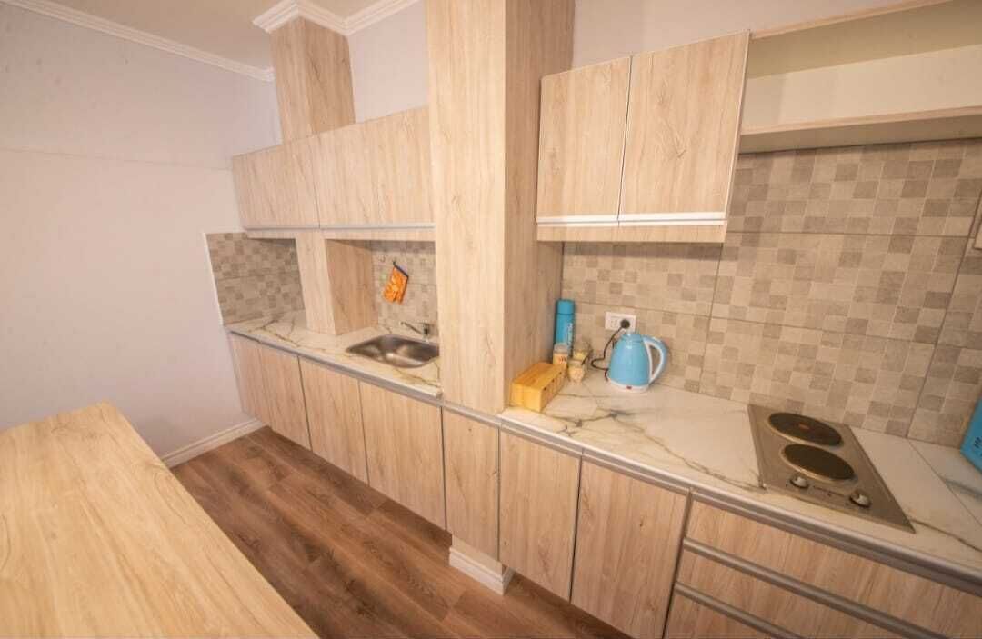 Departamento familiar | Cocina privada | Refrigerador con congelador, microondas y tostadora 