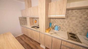 Departamento familiar | Cocina privada | Refrigerador con congelador, microondas y tostadora