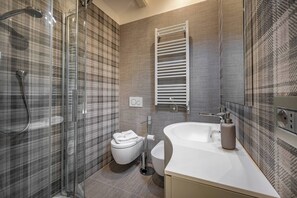 Hair dryer, towels, soap, shampoo