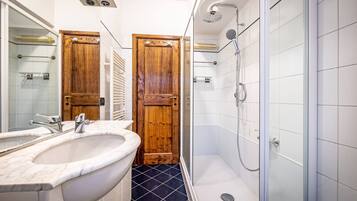 Shower, hair dryer, soap, shampoo