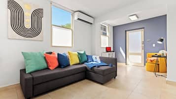 Departamento Confort | Área de sala de estar | Smart TV de 50 pulgadas con canales digitales