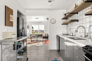 Coffee/tea maker, fridge, microwave, oven