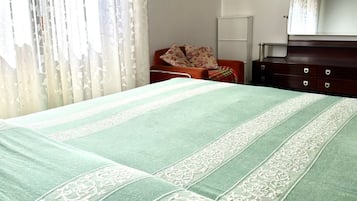 2 habitaciones y ropa de cama