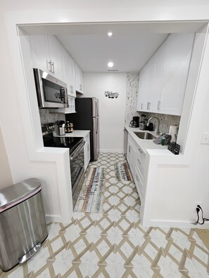 Microondas, horno, placa de cocina, lavavajillas