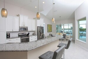 Fridge, microwave, oven, stovetop - Seaclusion - stunning bayfront home with pool (Englewood)