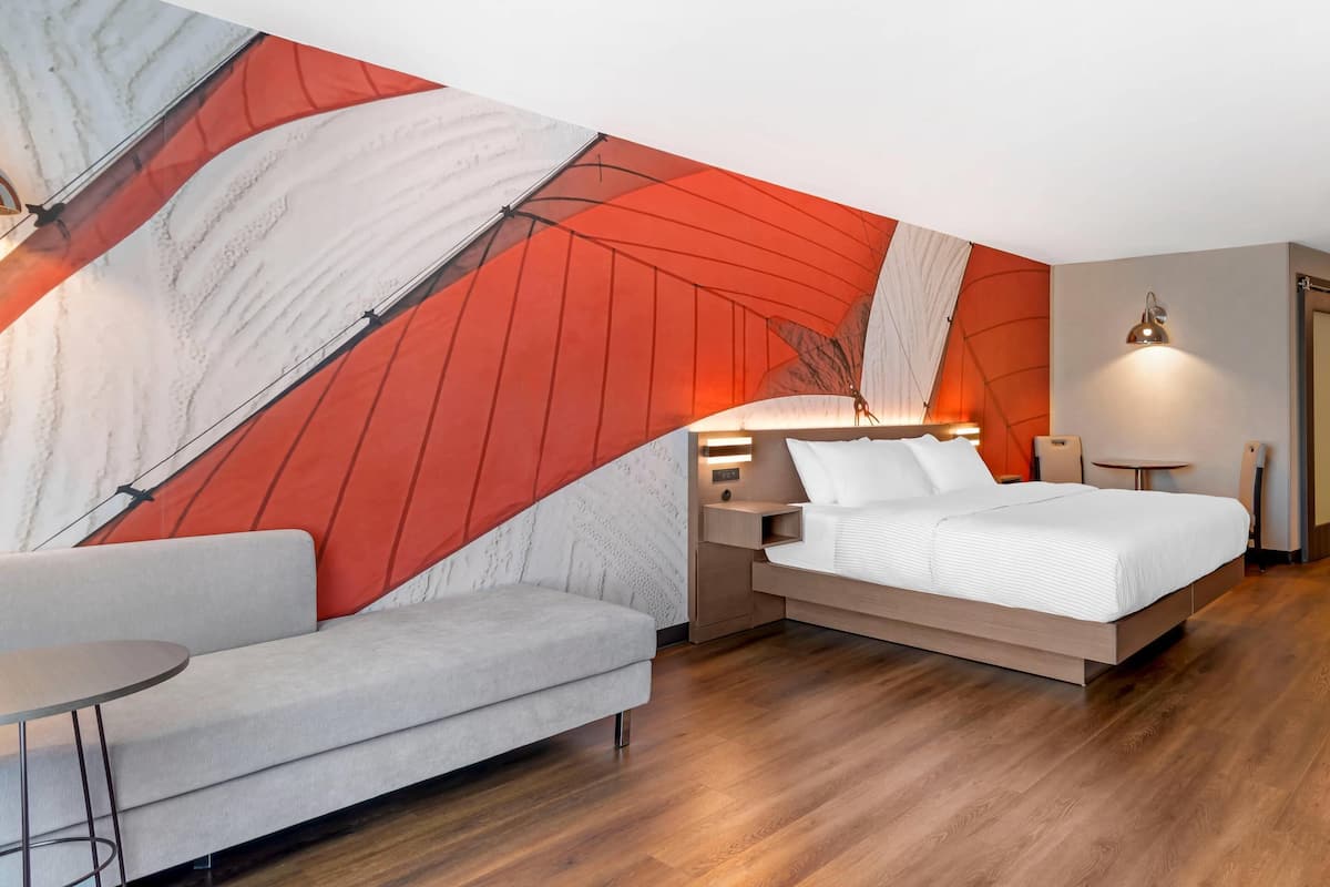 Suite, 1 King Bed, Hearing Accessible, Non Smoking (Mobility) | Laptop workspace, iron/ironing board, free WiFi, bed sheets