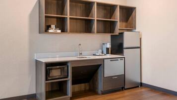 Suite, 1 King Bed, Non Smoking (Accesible) | Laptop workspace, iron/ironing board, free WiFi, bed sheets