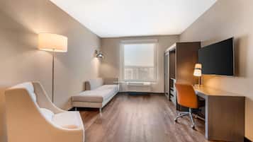 Suite, 1 King Bed, Non Smoking (Accesible) | Laptop workspace, iron/ironing board, free WiFi, bed sheets