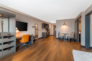 Suite, 1 King Bed, Non Smoking (Efficiency) | Laptop workspace, iron/ironing board, WiFi (free), bed sheets