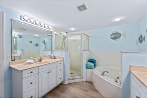 Shower, jetted tub, hair dryer, towels