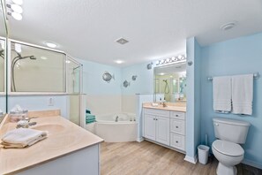 Shower, jetted tub, hair dryer, towels