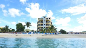 On the beach, sun loungers, beach towels
