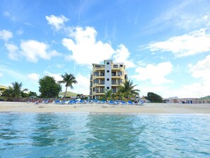On the beach, sun-loungers, beach towels - Oceanfront Condo with breathtaking views and private beach access. (Philipsburg)