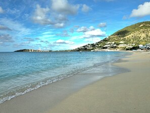 On the beach, sun-loungers, beach towels - Oceanfront Condo with breathtaking views and private beach access. (Philipsburg)