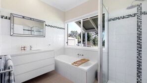 Shower, hair dryer, towels