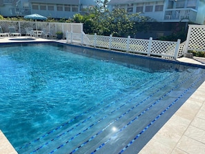 Outdoor pool, a heated pool - Central Beach Haven: Stylish 2 Bed Coastal Retreat Near It All (Frigate Bay)