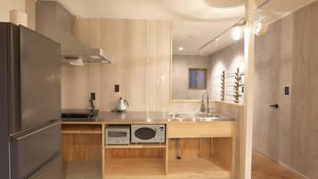 Fridge, microwave, cookware/dishes/utensils
