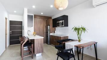 Fridge, microwave, stovetop, coffee/tea maker