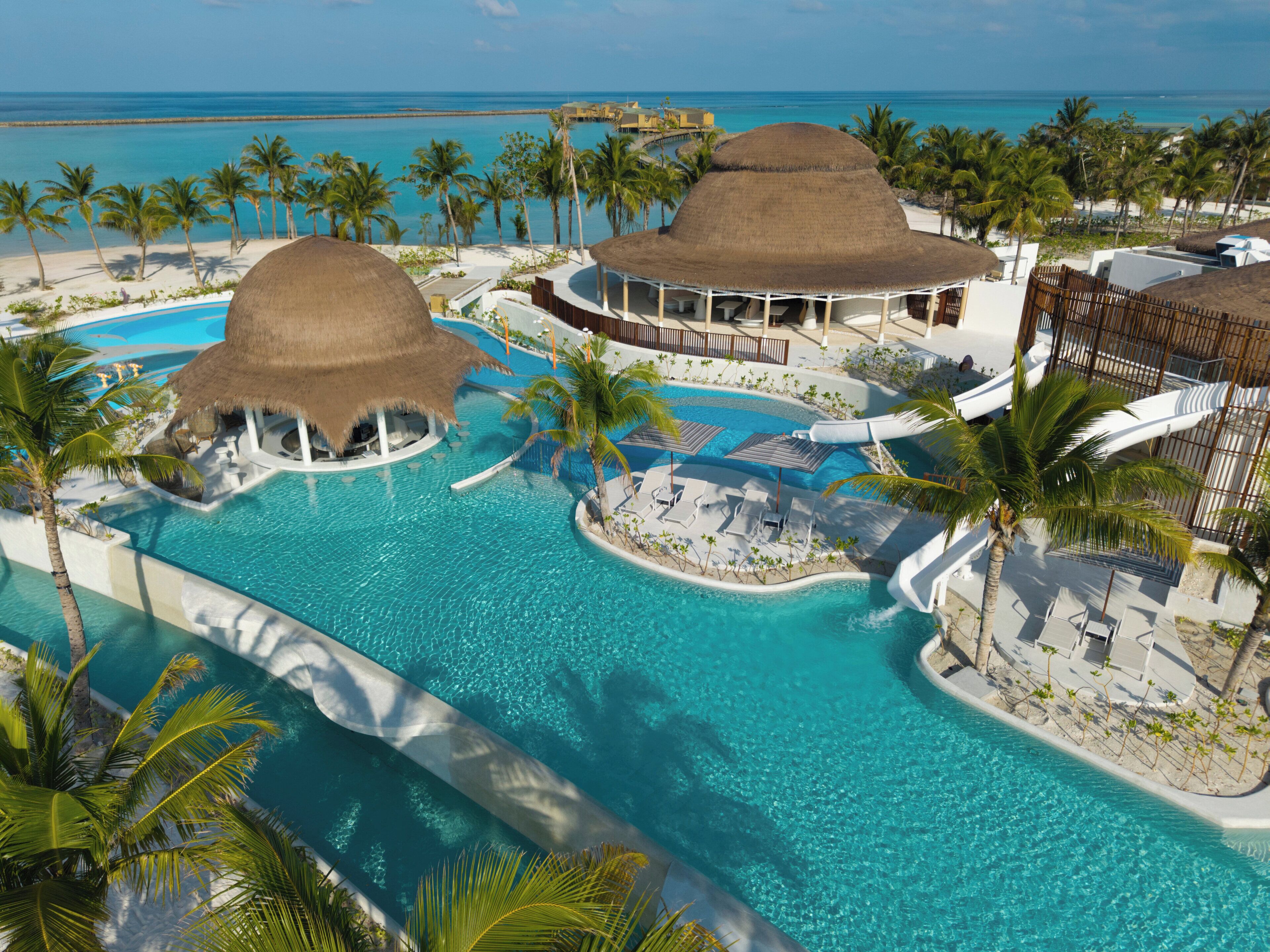 Outdoor pool, free pool cabanas, pool umbrellas