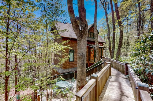 Luxe home overlooking Blue Valley & a stream with elevator & designer interior