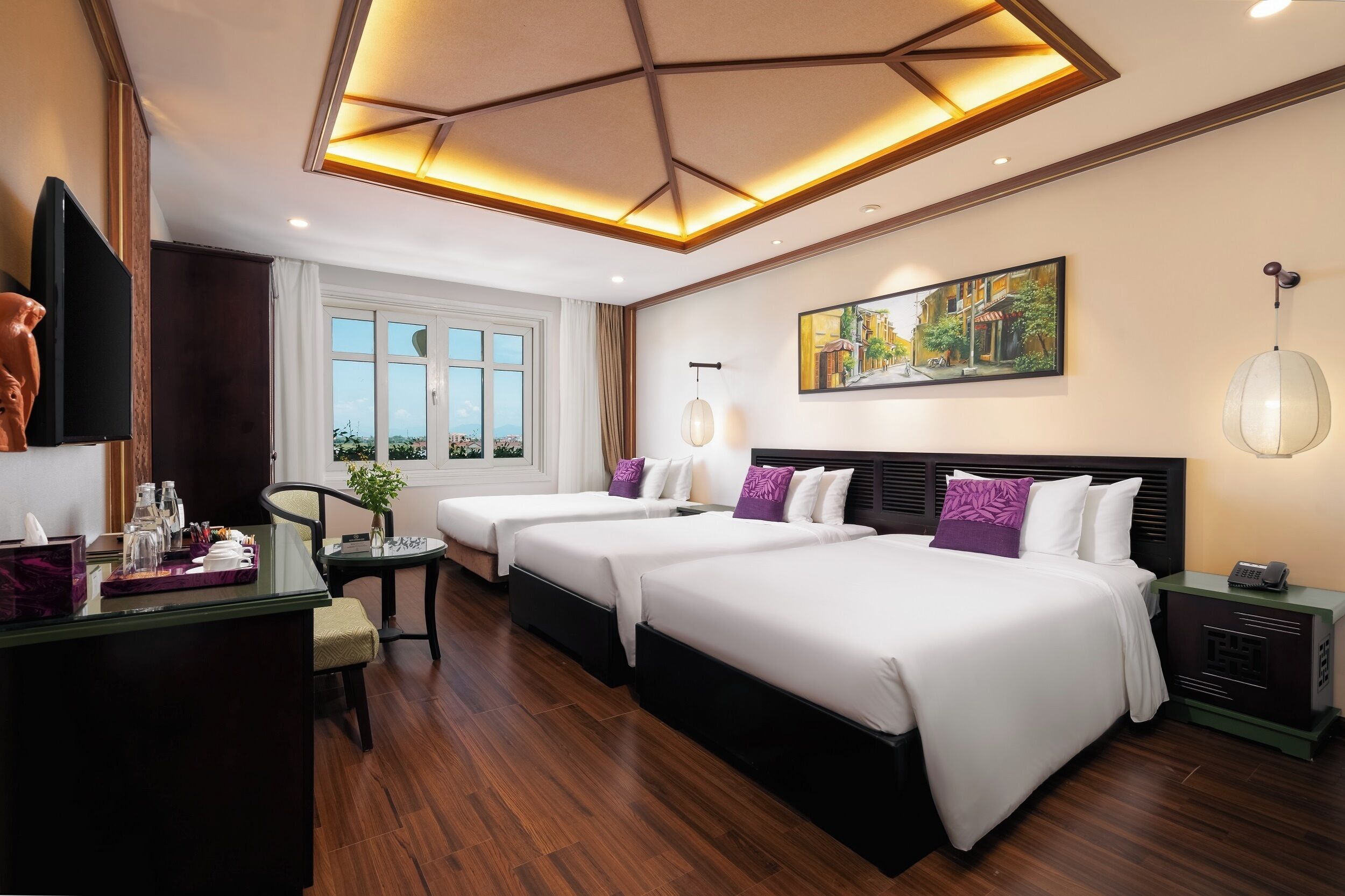 Family Triple Room | Minibar, in-room safe, desk, soundproofing