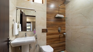 A modern bathroom with a sink, toilet, and shower. - The Pine Retreat - Mall Road Dalhousie (Dalhousie)